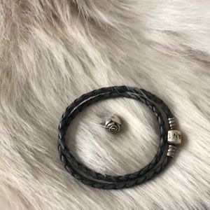 Pandora leather bracelet with charm.